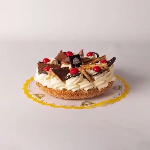 Tompoucetaart middel